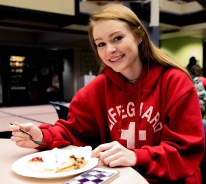 Student eating pancakes