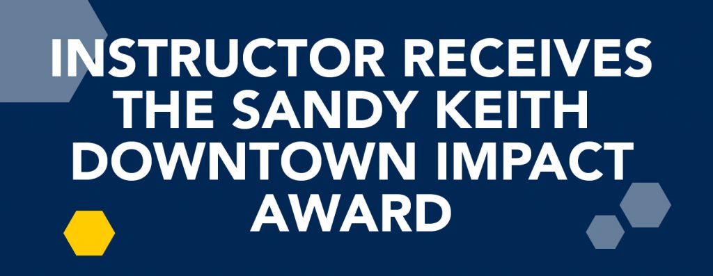 RCTC English Instructor and Local Musician John Sievers receives the Sandy Keith Downtown Impact Award